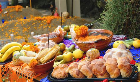 How is food incorporated into the ofrendas or altars? And why does the aroma of marigolds seem to whisper secrets to the departed?